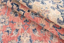 Corner detail of 1950s Vintage rug showing border pattern and Wool pile
