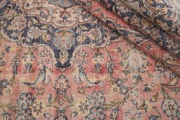 Close-up detail of 1980s Vintage rug from Iran / Persia showing Wool weave