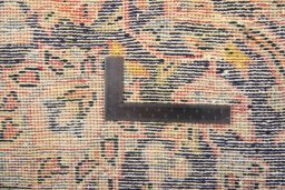 Surface texture of 1980s Vintage rug with natural Wool and intricate pattern