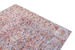 Surface texture of 1950s Vintage rug with natural Wool and intricate pattern