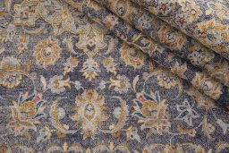 Surface texture of 1980s Vintage rug with natural Wool and intricate pattern
