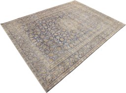Close-up detail of 1980s Vintage rug from Iran / Persia showing Wool weave