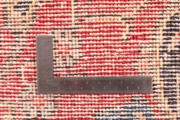 Backside of handmade 1955s Vintage rug showing knot structure and weave density