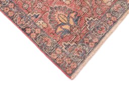 Backside of handmade 1955s Vintage rug showing knot structure and weave density