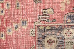 Close-up detail of 1980s Vintage rug from Iran / Persia showing Wool weave