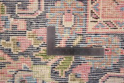 Surface texture of 1970s Vintage rug with natural Wool and intricate pattern