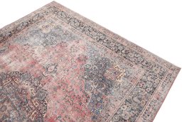 Surface texture of 1970s Vintage rug with natural Wool and intricate pattern
