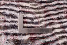 Close-up detail of 1950s Vintage rug from Iran / Persia showing Wool weave