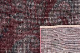 Close-up detail of 1950s Vintage rug from Iran / Persia showing Wool weave