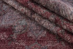 Corner detail of 1950s Vintage rug showing border pattern and Wool pile
