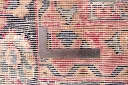 Close-up detail of 1950s Vintage rug from Iran / Persia showing Wool weave