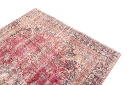 Surface texture of 1950s Vintage rug with natural Wool and intricate pattern
