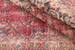 Corner detail of 1950s Vintage rug showing border pattern and Wool pile