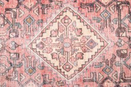 Close-up detail of 1950s Vintage rug from Iran / Persia showing Wool weave