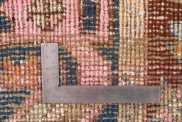 Corner detail of 1955s Vintage rug showing border pattern and Wool pile