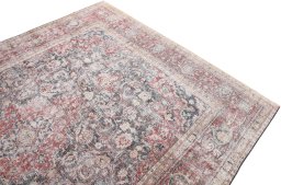 Surface texture of 1970s Vintage rug with natural Wool and intricate pattern