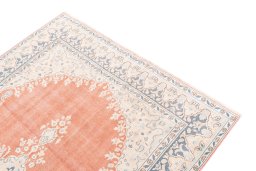 Surface texture of 1955s Vintage rug with natural Wool and intricate pattern