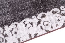 Backside of handmade 1975s Vintage rug showing knot structure and weave density