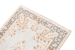 Surface texture of 1960s Vintage rug with natural Wool and intricate pattern