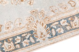 Backside of handmade 1960s Vintage rug showing knot structure and weave density