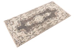 Corner detail of 1955s Vintage rug showing border pattern and Wool pile