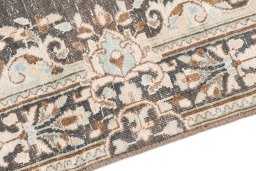 Backside of handmade 1955s Vintage rug showing knot structure and weave density