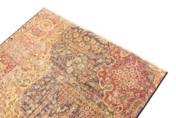 Surface texture of 1945s Vintage rug with natural Wool and intricate pattern