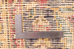 Close-up detail of 1945s Vintage rug from Iran / Persia showing Wool weave