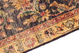 Backside of handmade 1945s Vintage rug showing knot structure and weave density