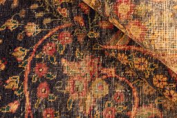 Corner detail of 1945s Vintage rug showing border pattern and Wool pile