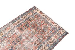 Surface texture of 1940s Vintage rug with natural Wool and intricate pattern