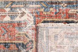 Close-up detail of 1940s Vintage rug from Iran / Persia showing Wool weave