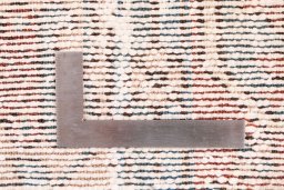 Corner detail of 1940s Vintage rug showing border pattern and Wool pile