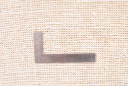 Corner detail of 1972s Vintage rug showing border pattern and Wool pile