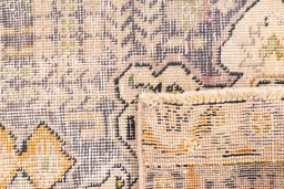 Close-up detail of 1970s Vintage rug from Iran / Persia showing Wool weave
