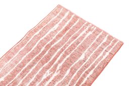 Surface texture of 1972s Vintage rug with natural Wool and intricate pattern