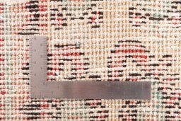 Corner detail of 1976s Vintage rug showing border pattern and Wool pile