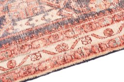 Backside of handmade 1970s Vintage rug showing knot structure and weave density