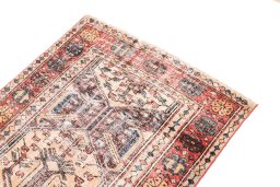 Surface texture of 1970s Vintage rug with natural Wool and intricate pattern