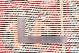 Corner detail of 1970s Vintage rug showing border pattern and Wool pile