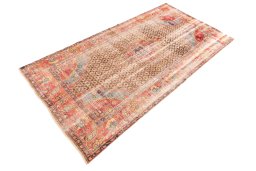 Close-up detail of 1971s Vintage rug from Iran / Persia showing Wool weave