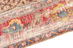 Backside of handmade 1971s Vintage rug showing knot structure and weave density