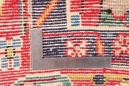 Corner detail of 1971s Vintage rug showing border pattern and Wool pile