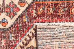Close-up detail of 1972s Vintage rug from Iran / Persia showing Wool weave