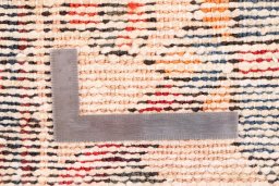 Corner detail of 1972s Vintage rug showing border pattern and Wool pile