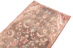 Surface texture of 1975s Vintage rug with natural Wool and intricate pattern