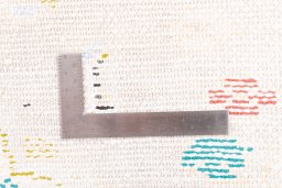 Corner detail of 1970s Vintage rug showing border pattern and Wool pile