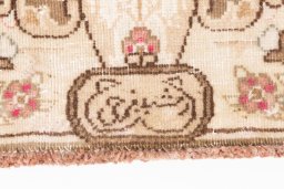 Corner detail of 1995s Vintage rug showing border pattern and Wool pile