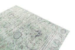 Surface texture of 1955s Vintage rug with natural Wool and intricate pattern