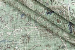 Corner detail of 1955s Vintage rug showing border pattern and Wool pile